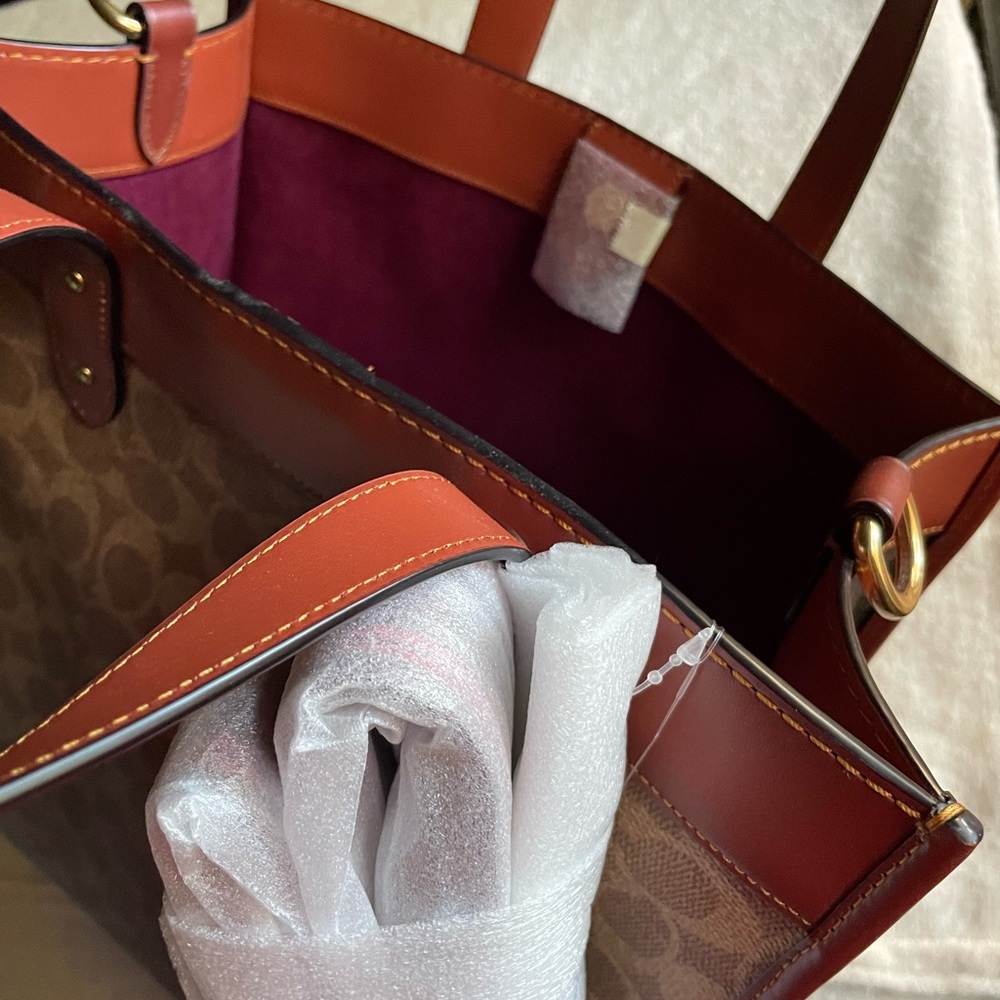 coach shoulder/hand bag. Brand new with tags. Beautiful Caramel and tan color. - Picture 3 of 6